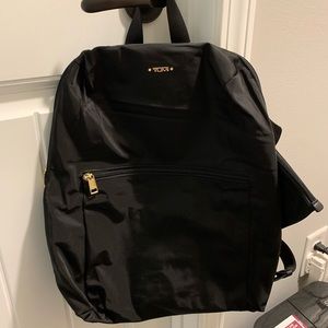 Tumi back back and small pouch